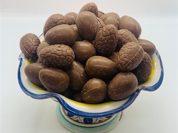 Massieve melk eitjes per 100 gram